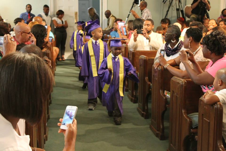 Graduating Class of 2013 walking down the isle.
